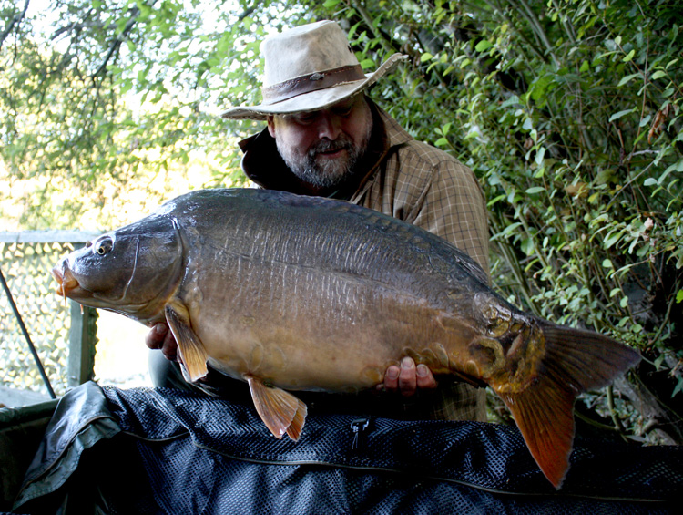 Shaun Harrison with a carp from Quarry Bank Fishery, France