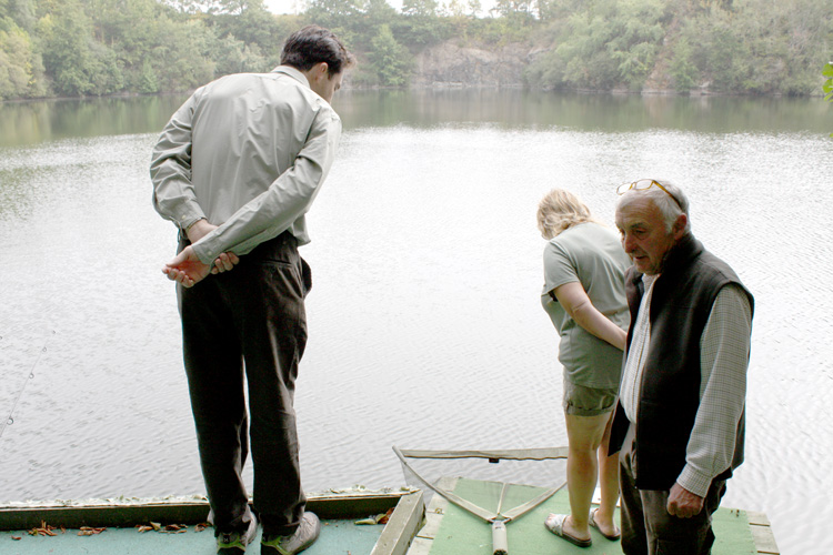 Tim, Lin and Neil witness the fish.