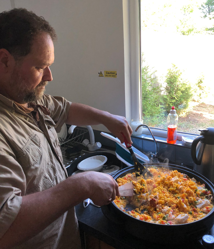 Shaun Harrison cooks dinner at Quarry Bank Fishery